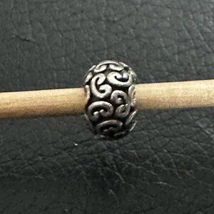 Pandora Authentic “Feeling Groovy” Retired Charm
